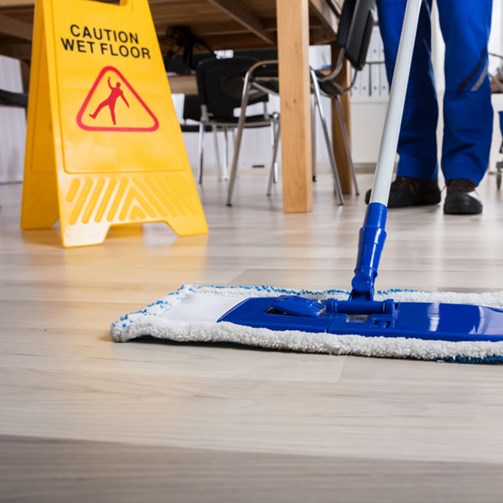 Wet floor sign and mop